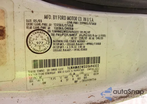 2003 Lincoln Town Car Signature z USA, uszkodzony, nr VIN 1LNHM82W33Y694322